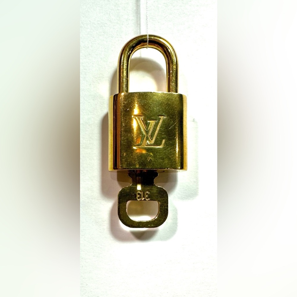 Authentic LV Louis Vuitton lock and key - $70 each or 2 for $$130 - Picture 10 of 16